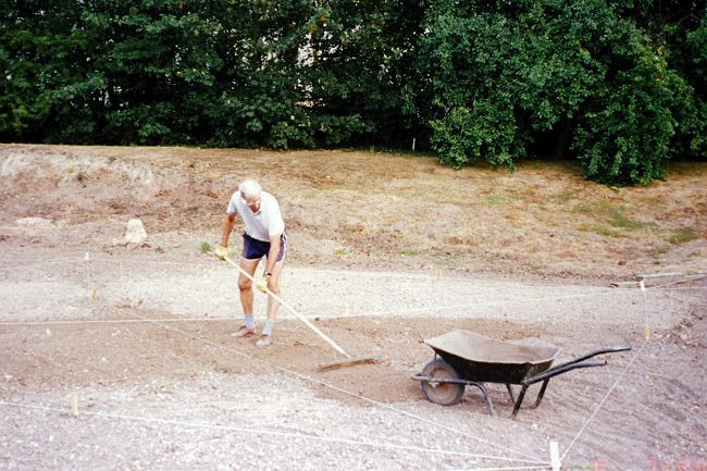 8Untitled-Scanned-20 111_edited-1.jpg - The lonely worker raking and levelling "forever" - a tedious job.